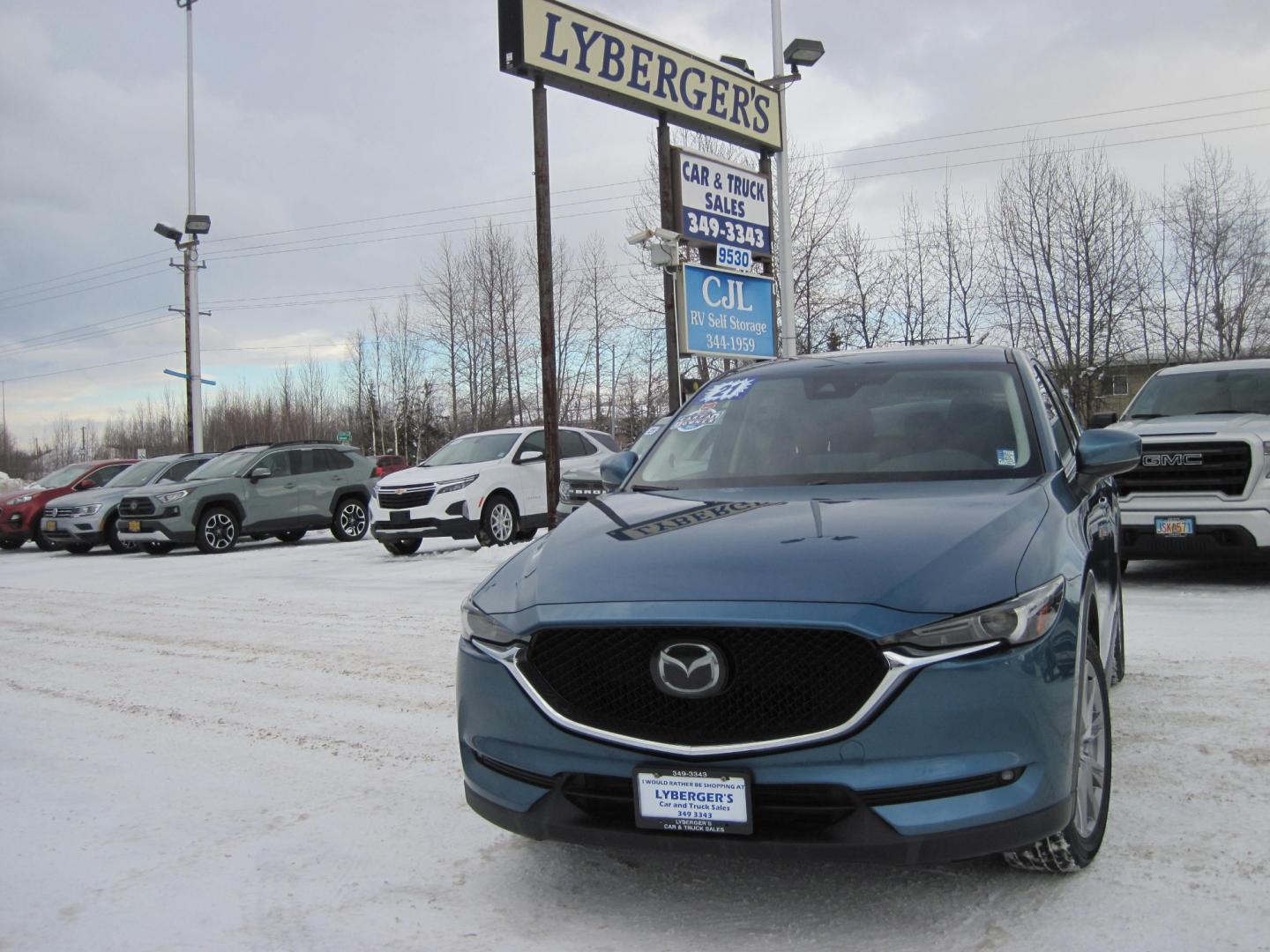 2021 blue /black Mazda CX-5 (JM3KFBDM6M1) , 6A transmission, located at 9530 Old Seward Highway, Anchorage, AK, 99515, (907) 349-3343, 61.134140, -149.865570 - Nice Mazda CX-5 Grand Touring sunroof, come take a test drive. - Photo#1